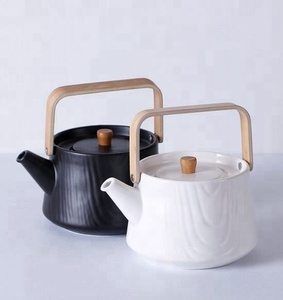 Wholesale Embossed Moroccan <strong>Ceramic</strong> <strong>Tea</strong> <strong>Pot</strong> with Wooden Handle - Product Image 1