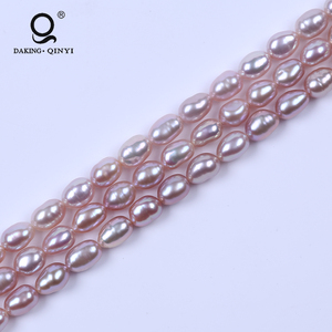 Daking Gros 5-6mm <span class=keywords><strong>Violet</strong></span> Un <span class=keywords><strong>Riz</strong></span> Forme D'eau Douce Réel Perle Strand Pour Collier - Product Image 1