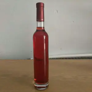 苗条的高圆形空伏特加酒收缩包装玻璃瓶