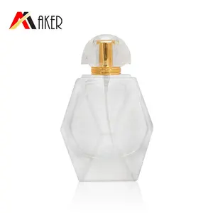工厂中国供应商100毫升透明菱形香水玻璃瓶，带金铝喷雾器亚克力盖