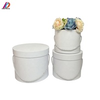Boîte à fleurs ronde en papier de luxe, emballage avec poignée