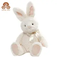 गर्म बिक्री कस्टम नरम सफेद प्यारा आलीशान ईस्टर बनी पशु खिलौना गुड़िया छुट्टी उपहार के लिए धनुष के साथ