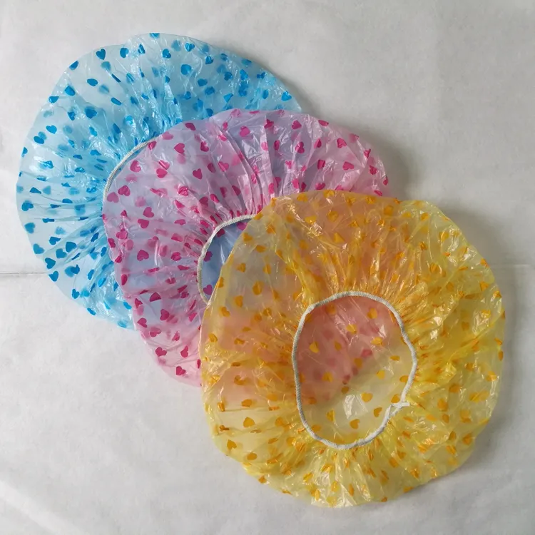 निविड़ अंधकार डिस्पोजेबल कैप स्नान प्लास्टिक बाल स्नान महिलाओं के लिए टोपियां कैप स्नान थोक बाल सैलून घर में इस्तेमाल के आइटम