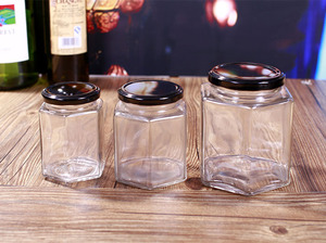 ขวดแก้วทรงรีหกเหลี่ยมทุกชนิด ขนาด 500 กรัม 380 มล. ขวดแก้วใส่น้ำผึ้ง ฝาโลหะสีดำ เงิน ทอง แบบกำหนดเอง ขวดแก้วหรูหราสำหรับใส่น้ำผึ้งและแยม - Product Image 5