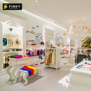 Modern Fashion Children Shop <strong>Window</strong> Display Table <strong>Shelves</strong> Interior Layout Decoration Customized Kids Clothes Shop Design - Product Image 1