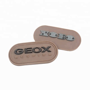 New Design OEM Custom 3D Raised Brand Name Logo Soft PVC Rubber Patches With Stamping Metal Letters