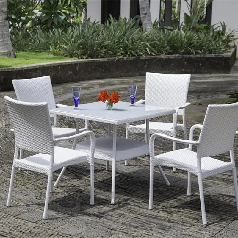 Sillas y mesas de jardín de ratán de plástico blanco de gama alta