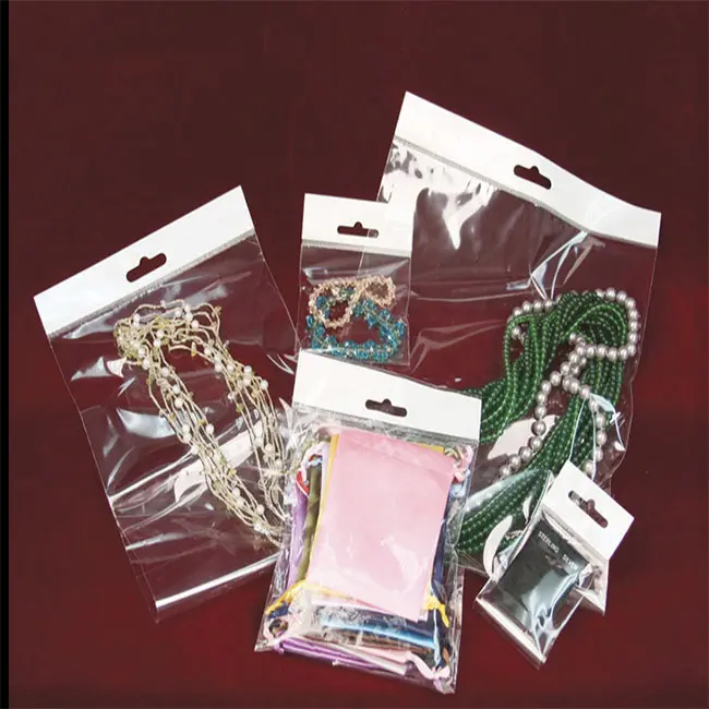 Wholesale Custom Printed OPP Self Adhesive Bags / Clear Transparent Jewelry Cellophane Plastic Bags With Seal Flap