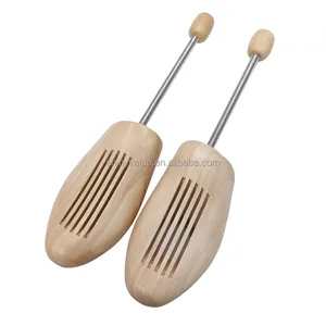 Shoe tree type and wood material shoe stretcher with bendable spring