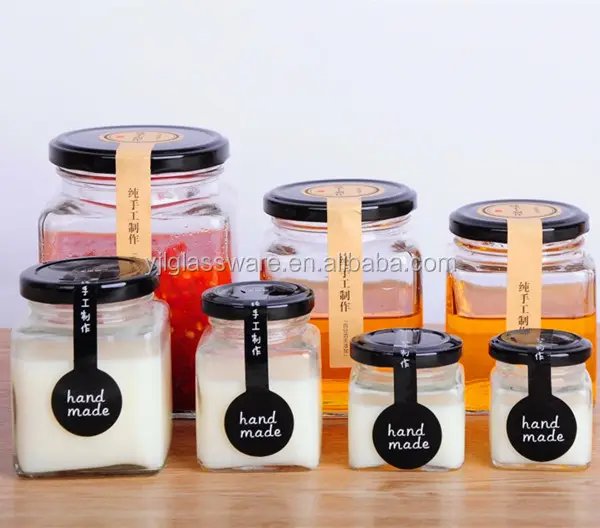 Food grade tersedia dengan ukuran yang berbeda bentuk persegi stoples madu kaca grosir jam jar mini jam