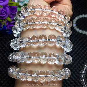 Al por mayor cristal natural 10.8-11.8mm blanco claro cristal poliedro oval pulsera de los granos - Product Image 2
