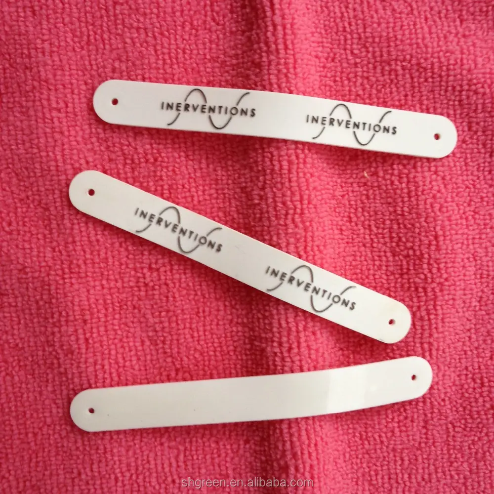 Pure white long rubber label with two sewing holes,3D embossed logo PVC sewing on rubber labels