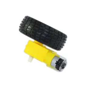 Yellow plastic motor with wheel for basic projects and toy