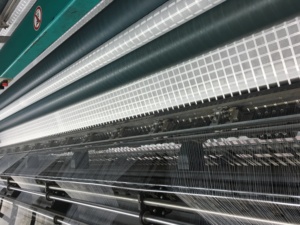 Gebreide Polyester <span class=keywords><strong>Geogrid</strong></span> Composiet Geweven Geotextiel Voor Road Bestrating Materiaal - Product Image 4