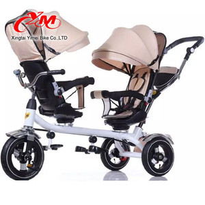 2016 xingtai yimei 4 en 1 niños <span class=keywords><strong>triciclo</strong></span> asiento doble/girar asiento niños gemelos <span class=keywords><strong>triciclo</strong></span>/dos asientos bebé <span class=keywords><strong>triciclo</strong></span> con dosel - Product Image 1