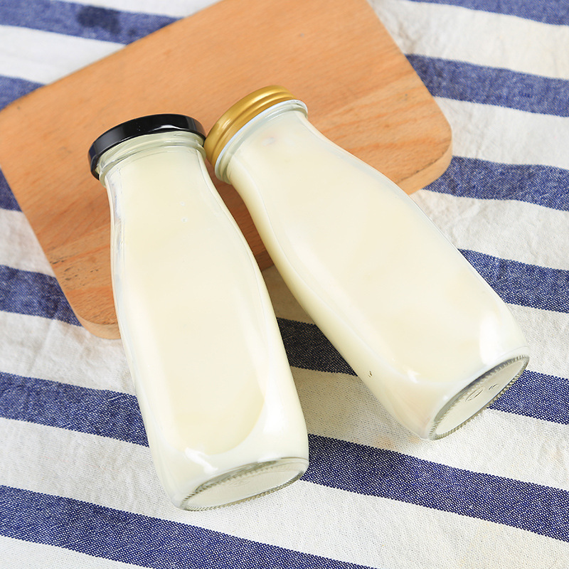 Haonao customized capacity clear small glass milk bottle with metal screw lid