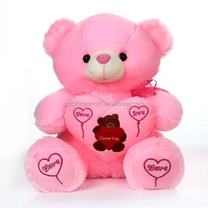 Muñeco de felpa de San Valentín oso de peluche rosa con corazón en la mano