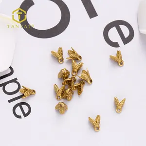 Muestras Gratis chapados en oro filigrana flor en forma de grano tapas para la fabricación de la joyería DIY