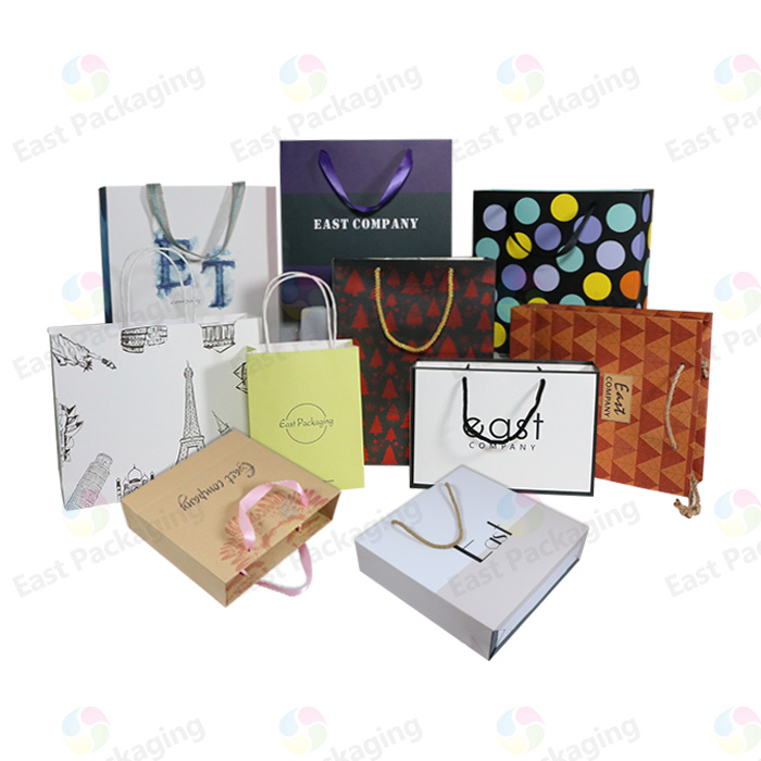 Luxury Blue Eco-friendly Paper Packaging Bags With Ribbon Handle For Skincare Cosmetic Shopping