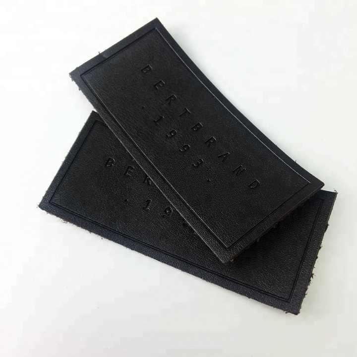 Fabrik preis Benutzer definiertes geprägtes Logo Auf echten Leder etiketten und Aufnähern für Jeans nähen