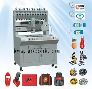 Automatique silicone/PVC vêtements étiquette/logo distribution machine