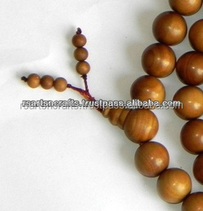 Pulsera de cuentas de sándalo redondas talladas religiosas para uso espiritual Cuentas de madera Premium - Product Image 4