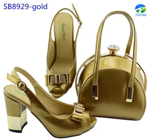 Guangzhou sepatu hak tinggi dan tas set murah impor tas dalam warna emas