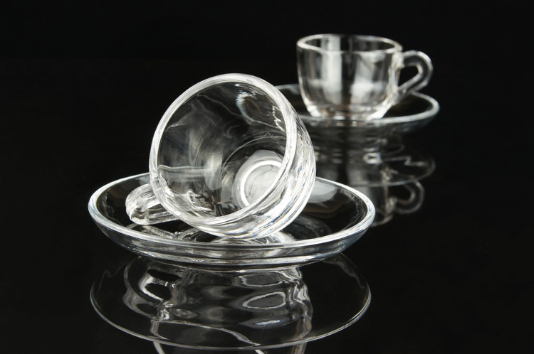Clear glass coffee cup set with handle and saucer