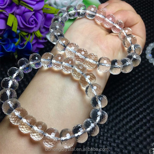 Al por mayor cristal natural 10.8-11.8mm blanco claro cristal poliedro oval pulsera de los granos - Product Image 4