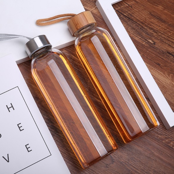 Custom Glass Water Bottle Supplier Outdoor Sports Portable Glass Water Bottle With Stainless Steel And Bamboo Lid