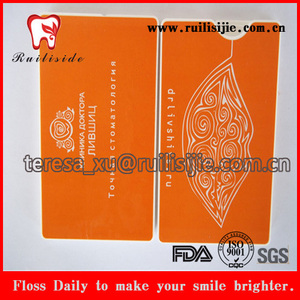 Cuidado bucal menta encerada con sabor tarjeta forma Hilo Dental - Product Image 1