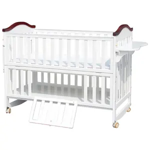 high quality solid wood adjustable babybed with storage