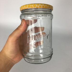 Pot en verre transparent vide de 600 ml en gros, forme unique, stockage de miel avec couvercle à logo design - Product Image 2
