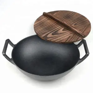 带木制盖子的电动或感应炉灶面用铸铁炒锅