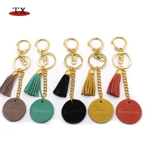 Custom luxury colorful lady round real PU leather with tassels golden color keyring