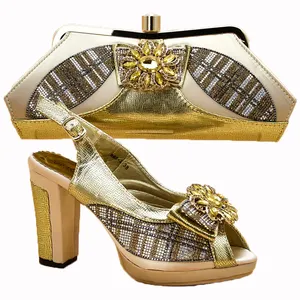 广东工厂批发最新设计的金鞋和派对女包