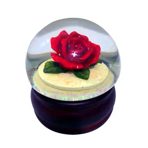 wholesale resin material flower rose water globe with snow ball home decor custom Personal design of water ball