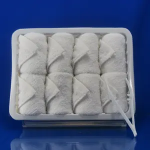 Rolled reusabl cotton towel in tray for kitchen restaurant home and hotel