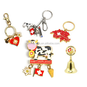 Recuerdo suizo Suiza vaca llavero Edelweiss Swiss Golden Charms nevera imán cena campana recuerdos tienda de regalos Abastecimiento - Product Image 1