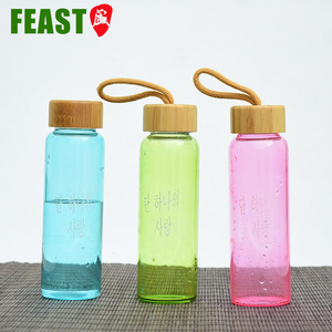 Botella de vidrio de borosilicato de bambú con tapa de madera, botellas de agua respetuosas con el medio ambiente - Product Image 1