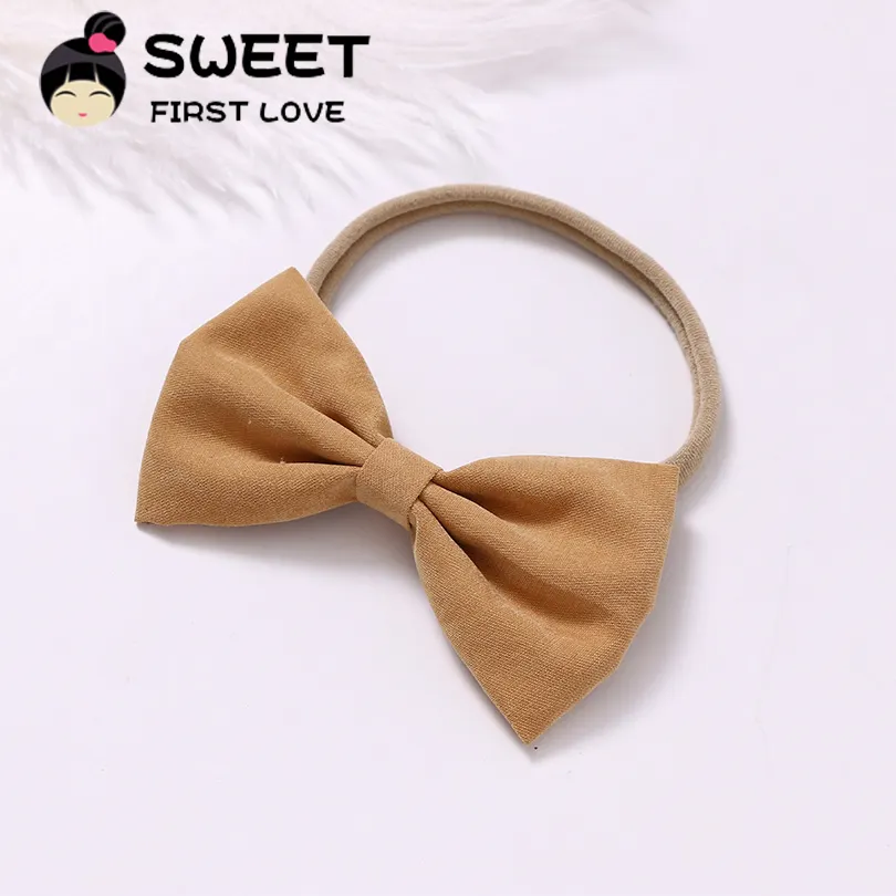 Semplice e popolare Coreano panno di camoscio multicolore dei capelli del bambino del nastro con pieghettato bow moda elastiche dei capelli dei bambini del nastro