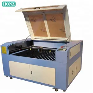 Fábrica de Jinan! Nova máquina de corte a laser de alimentação automática barata para tecido com mesa transportadora HONZHAN