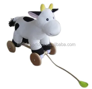 PL2016-cow de vaca de felpa con ruedas, venta al por mayor, se puede tirar.