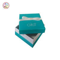Vente en gros en stock Boîte de rangement pour bijoux avec nœud blanc imperméable de luxe Organisateur de bagues, boucles d'oreilles et colliers en papier de qualité supérieure