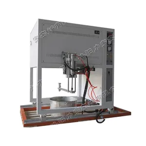 Automatic flow control frit furnace for melting glass