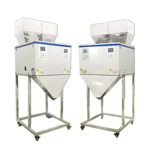 Nouvelle machine de remplissage et de pesage de granulés à double tête électrique semi-automatique 100-10000G pour les applications alimentaires et chimiques