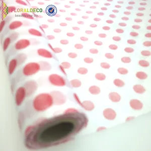 Al por mayor eco material puntos rojos fllower envoltura rollo de tela no tejida