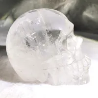 Escultura de cabeza de cristal de calavera de cuarzo transparente tallado grande natural de alta calidad a la venta