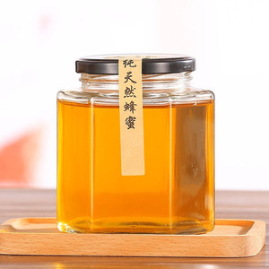 批发不同尺寸的带有黑色金属盖的六角形透明蜂蜜玻璃瓶 - Product Image 3