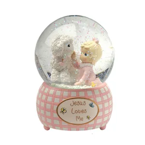 Nanwei jesus loves me welcome angel custom snow globe manufacturer for baptism and souvenirs